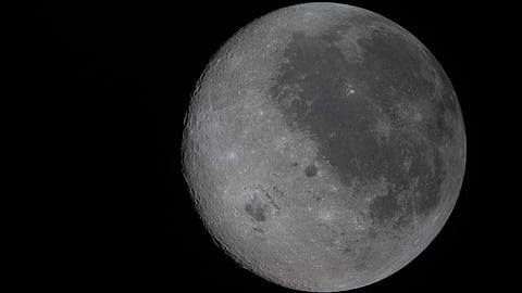 A new photo captures the Moon's near side on the right
