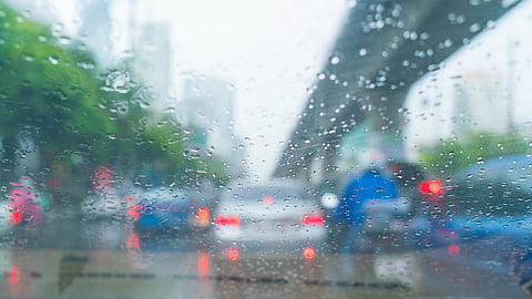 Dubai rain dust storm warning motorists driving safety Dubai Police alert low visibility roads UAE weather