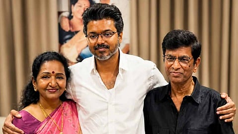 Vijay with his parents