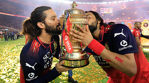 RCB stars with ipl trophy