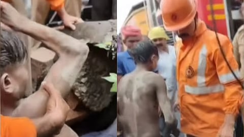 Migrant worker claims he was 'trapped inside drain