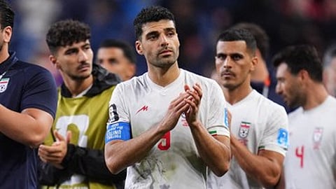 Iran's players leave the field after the World Cup Group G soccer match between Egypt and Iran