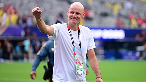 Norway head coach Stale Solbakken celebrates after the World Cup round of 16 soccer match between Brazil and Norway