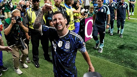 Argentina's Lionel Messi (10) reacts as he leaves the ground after their win in the World Cup semifinal soccer match between England and Argentina
