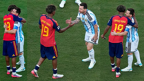 Spain's Lamine Yamal (19) hugs Argentina's Lionel Messi (10) after Spain's victory in the World Cup final soccer match between Spain and Argentina
