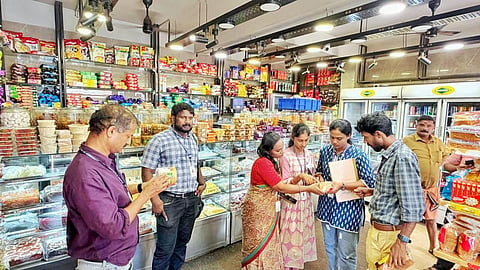 Food Sqaud checking in bakery