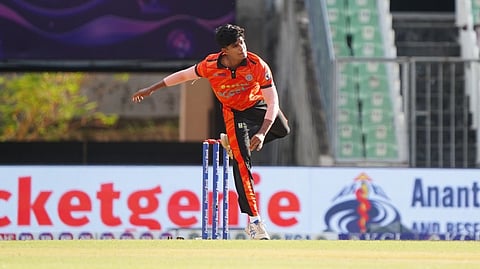 Vignesh Puthur bowling