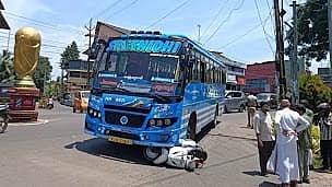 Scooter rider trapped under bus in Payyannur escapes miraculously