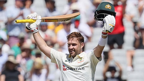 Australia's Josh Inglis celebrates his hundred, on day three of the third cricket test match between South Africa and Australia, in Cape Town
