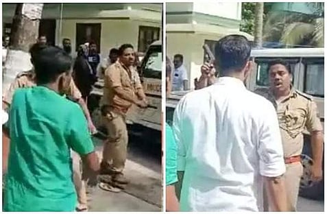 കവരത്തി എസ്ഐ സമരക്കാര്ക്ക് നേരെ തോക്കു ചൂണ്ടുന്നു/വീഡിയോ സ്ക്രീന്ഷോട്ട്