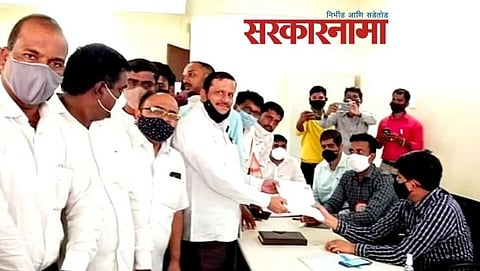 Bharat Shah filling up the candidature application for Karmayogi Sugar factory