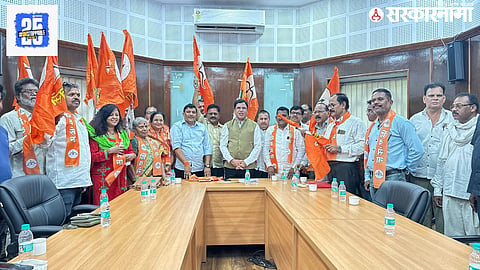 Former corporators from BJP, MNS, and BSP join Eknath Shinde's Shiv Sena in Nagpur, signaling a major political realignment.