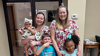 Claire with her mother and her three children.