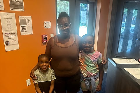Joyce with two of her grandchildren