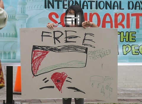 FREE PALESTINE. A girl made her own placard to show support for Palestinian people during the International Day of Solidarity with Palestinian people at Freedom Park, Roxas Ave., Davao City on Thursday, November 29, 2023. The war between Israel and Hamas has entered its 54th day today and still has no signs of stopping, thus rallies for peace are being held, not only in Davao City but across the globe.