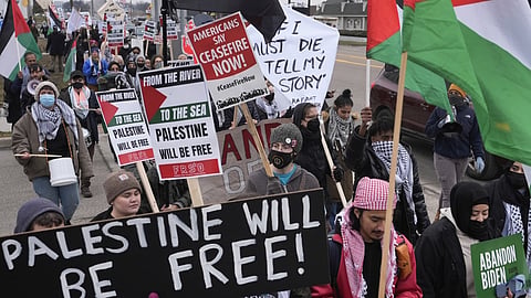 PRO-PALESTINIAN demonstrators march during a visit by President Joe Biden in Warren, Mich., Thursday, Feb. 1, 2024. / AP