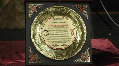 The plaque of recognition for former President Rodrigo Duterte during the 52nd Conferment of Datu Bago Awards 2024, on Wednesday evening, March 13, 2024, at the Arcadia Event Center, Matina, Davao City. Duterte, however, was absent during the event.