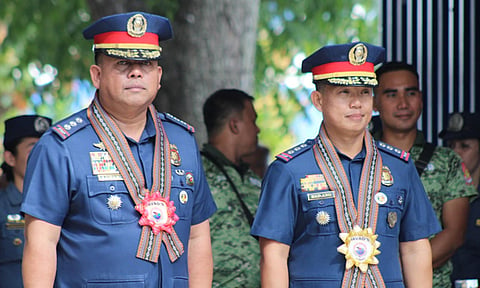 Former DCPO Director Police Colonel Alberto Lupaz (left) and New Director Police Colonel Richard Bad-ang (right)