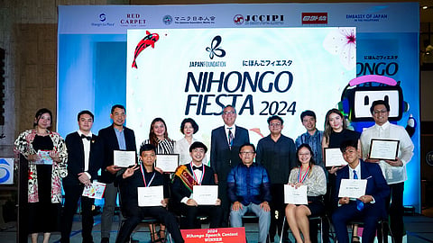 Standing from left: Mr. Jessie Batohanon and Ms. Nyra Gray (Speakers); Ms. Yuko Fujimitsu, Mr. Shigeru Shimoda, Mr. Renei Val Perez, Mr. Shigehiro Matsuda (Judges); Ms. Marilene Angelina Perez, Mr. Kenichiro Kurusu (Guest Speakers). Seated from left: Mr. Anfeerne Tizon (3rd Place); Mr. Jacob Fuentebella (Grand Champion); Mr. Ben Zuzuki (Chairman of the Board of Judges and JFM Director); Ms. Erina Sotoya (Second Place) and Mr. Nino Mesajon (Special Jury Prize).