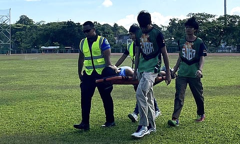 An athlete was taken to the ambulance after sustaining injury during a game at the Davao Region Athletics Association (Davraa) Meet 2024 games at the University of Mindanao-Matina Campus on Wednesday morning, April 3, 2024.