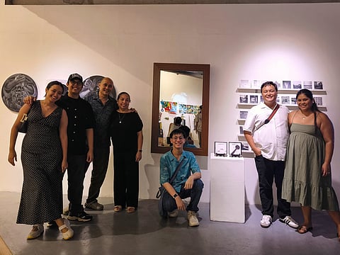 Aeson Baldevia and his family during the opening of the exhibit