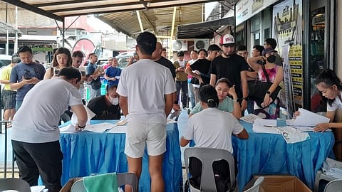 HOKA KITS. Hoka Trilogy Run Davao Leg 1 participants claim their race kits at the Podium MultiSport Wheels N More Drive Compound along J.P. Laurel Avenue, Davao City on Thursday, June 13.