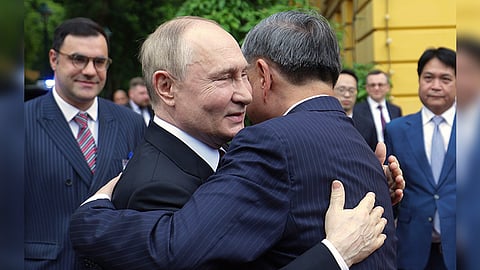 VIETNAM VISIT. Russian President Vladimir Putin (left) and Vietnamese President To Lam embrace during an official welcome ceremony at the Presidential Palace, in Hanoi on Thursday, June 20, 2024. / AP