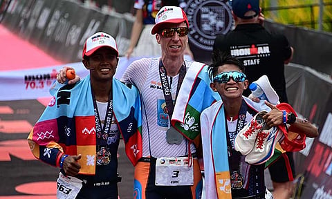 TOP 3 FINISHERS. Dutch triathlete Eric van der Linden claimed the top spot as the overall champion. He was followed by Filipinos John Patrick Ciron and Franklin Yee, who secured 2nd and 3rd place, respectively, at the IRONMAN 70.3 Davao in Davao City on Sunday, Aug. 11, 2024.