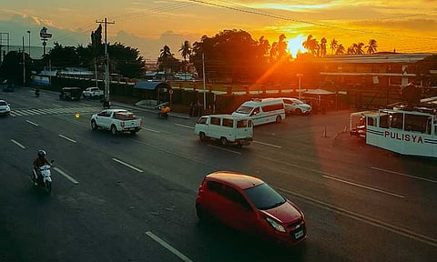 CLEARING THE WAY. The last police barricades outside the KOJC Compound were removed on Wednesday, August 28, 2024, restoring full access to all six lanes of the Carlos P. Garcia National Highway in Buhangin, Davao City. Traffic now flows smoothly, offering much-needed relief to commuters. As the sun sets, this reopening fully of the highway marks a return-to-normal for drivers, easing congestion and ensuring a more efficient drive home.