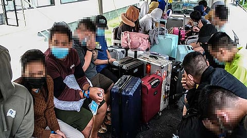CHARGED. Some of the 169 foreign nationals, who were caught in an alleged Pogo raid at the Tourist Garden Hotel in Barangay Agus, Lapu-Lapu City on Aug. 31, 2024, were charged with human trafficking. /