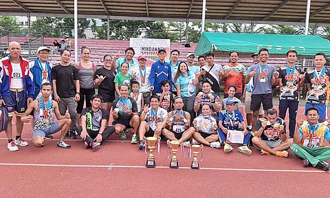 REUNION. The first-ever Mindanao Open Masters Athletics Championships at the University of Mindanao, Matina, Davao City, brought together former varsity track stars from Davao City and across the Davao region. Pictured are the medalists alongside the event organizers.