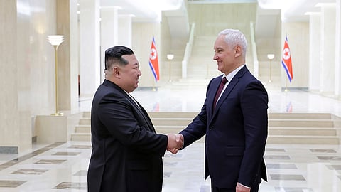In this photo provided by the North Korean government, North Korean leader Kim Jong Un, left, shakes hands with Russian Defense Minister Andrei Belousov in Pyongyang, North Korea Friday, November 29, 2024.