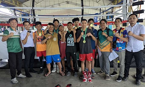 BOXING CHAMPS. Unit 1, powered by standouts from Davao City National High School (DCNHS), Vicenta Nograles NHS, and Erico Nograles NHS, extends its boxing dominance at the Dcaa Meet 2025, securing its sixth straight title.