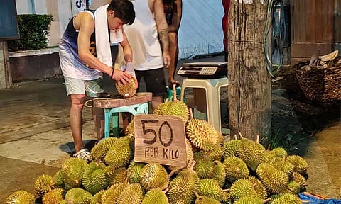 Durians were sold along the sidewalk of J.P. Laurel Avenue in Davao City on Wednesday evening, August 21, 2024.