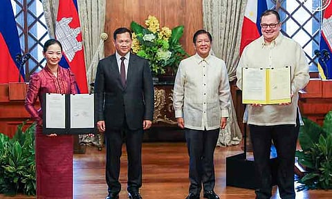 (From left) Cambodia Competition Commission (CCC) Chairperson Cham Nimul, Cambodian Prime Minister Samdech Moha Borvor Thipadei Hun Manet, Philippine President Ferdinand Marcos Jr. and Philippine Competition Commission (PCC) Chairperson Michael Aguinaldo during the presentation of the memorandum of understanding between the PCC and CCC at Malacañan Palace on February 11, 2025. Courtesy of Presidential Communications Office.