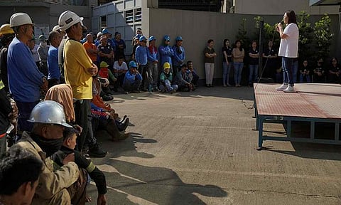 Trabaho Partylist nominee Atty. Johanne Bautista reminding skilled workers to prioritize their safety during a workplace visit.