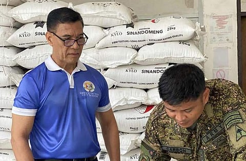 ZAMBOANGA. The City Government of Isabela in Basilan
province distributes on Tuesday, June 17, some 372
sacks of 25-kilogram rice worth 588,783 to various
uniformed personnel as part of its commitment to public
safety and welfare. City Administrator Pedrito Eisma
(left) led the distribution of rice on behalf of Mayor
Sitti Djalia Turabin-Hataman.