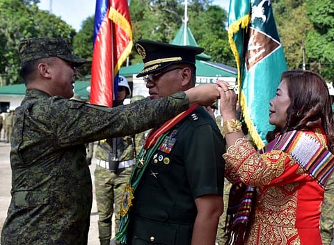 ZAMBOANGA. Major General Leonardo Peña, 11th Infantry Division (11ID) commander (left), confers the Distinguished Service Medal to Colonel Amadeo Cruz, 11ID acting chief of staff (center), in recognition of his exemplary and long-standing service. On Wednesday, July 9, the 11ID rendered honors to Cruz through a fitting Testimonial Parade and Review and Retirement Ceremony in recognition of his 35 years of faithful and distinguished military service to the nation.