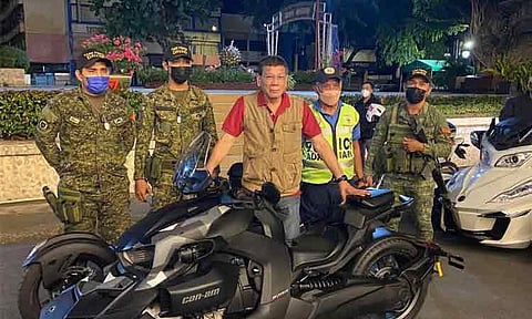 Senator Christopher "Bong" Go shared on August 9, 2022, photos of former President Rodrigo Duterte toured around Davao City on his motorcycle.
