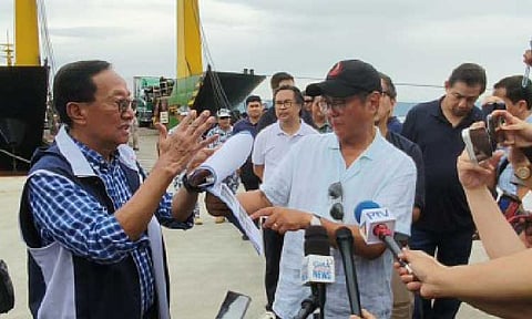 President Ferdinand R. Marcos Jr. (center) and DPWH Secretary Manuel Bonoan (left). (File photo)
