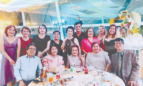 FAMILY. Celebrant Ellen Dosdos-Climaco (center) with (from left) Nicnic, May Ann C. Atienza, Christine and Jerry Climaco. Back row (from left): Tessie Javier, Oling Garcia, Gina Kahler, Marissa Salcedo, Virgie Cuenco, Ronald Dongog, Bebie Uy, Gemma Agustin and Inday Zaballa.