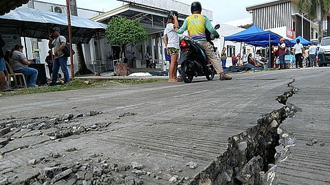 Photo showing visible cracks on an asphalt road near the Cebu Provincial Hospital in Bogo City, Cebu, following the powerful Magnitude 6.9 earthquake that struck the province on Tuesday night, September 30, 2025.