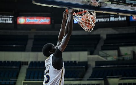 SLAM DUNK. Malian center Moussa Diakite of National University Nazareth School scores during the game against Ateneo de Manila University in the UAAP Season 88 juniors basketball tournament at the SMART Araneta Coliseum in Quezon City on Saturday (Oct. 18, 2025). The Bulldogs won, 99-74, to sweep the first round. (UAAP photo)