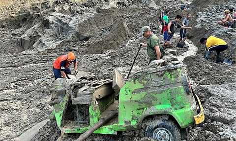 SEARCH CONTINUES. Search and retrieval operations continue in Barangay Palacapao, Quezon, Bukidnon, for a couple who were riding a tricycle when they were buried by soil after a portion of the Bukidnon-Davao Road in Sitio Kipolot collapsed on Saturday, October 18, 2025. The road in the affected area remains impassable as personnel from the Department of Public Works and Highways–Bukidnon 2nd District Engineering Office conduct assessments and explore possible alternate routes.