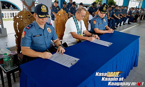 ILOILO. Provincial Administrator Dr. Raul N. Banias (center), representing Governor Arthur R. Defensor Jr., leads the turnover of P20.3 million to the Police Regional Office in Western Visayas (PRO 6) for the rehabilitation of its water system and the implementation of the Iloilo Police Provincial Office’s (Ippo) 4A’s Operation program during the Monday flag-raising ceremony at Camp Martin T. Delgado, Fort San Pedro, Iloilo City.