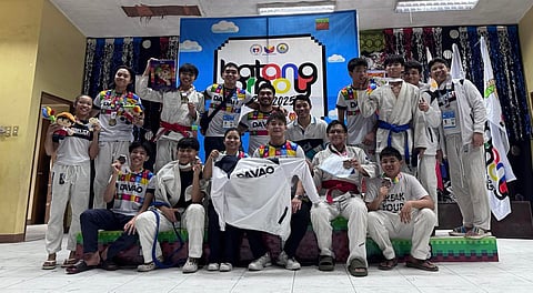 PROUD DABAWENYOS. Davao City’s young jiu-jitsu athletes and their coaches beam with pride after collecting medals at the Batang Pinoy 2025 tournament in General Santos City.