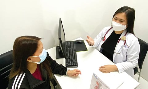 CHECKUP. Doctor consultation prior to vaccination.
