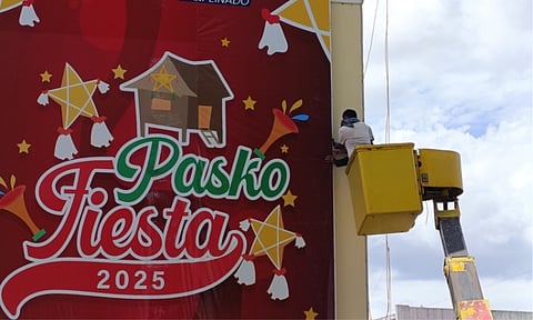 ONGOING PREPARATIONS. Preparations for this year’s Pasko Fiesta are in full swing, with large tarpaulins being installed outside the Davao City Hall on Thursday morning, November 20, 2025, along City Hall Drive.