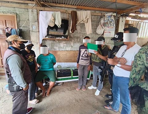 ZAMBOANGA. Lawmen arrest a regional target-listed drug personality (seated) and seize some P102,000 worth of illegal drugs in a law enforcement operation in Purok 1, Kilikili village, Wao, Lanao del Sur, on Saturday, November 22.