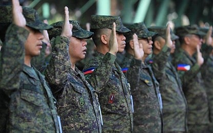 PROFESSIONALS. Philippine Army senior officers and enlisted personnel recite the "Panata sa Karapatang Pantao" during the simultaneous flag-raising ceremony in commemoration of the National Human Rights Consciousness Week at the Army headquarters in Fort Bonifacio, Taguig City on Dec. 1, 2025. The Army leadership is relying on the professionalism of its personnel to shun indiscriminate firing during the New Year festivities. (Photo courtesy of PA)